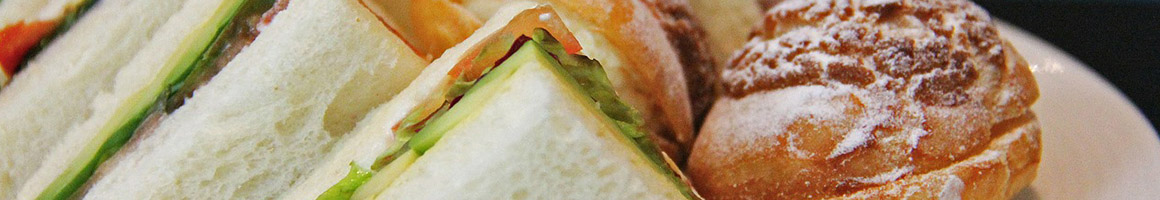 Eating Breakfast & Brunch Sandwich at Sandfiddler Cafe restaurant in Norfolk, VA.
